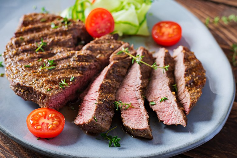 Grilled flank steak with salad